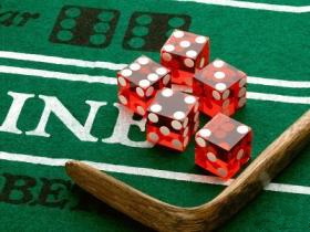 Five Dice with Stick on craps tables.