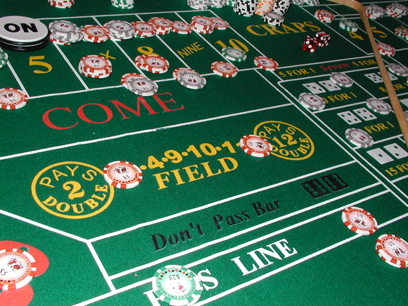 Craps table with come chips, places bets, and buy bets.