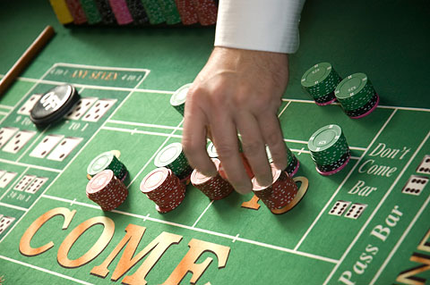craps table with buy bets and place bets on the numbers.