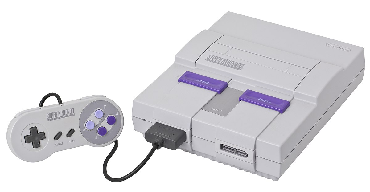 SNES - Super Nintendo® Entertainment System® game console and a controller.